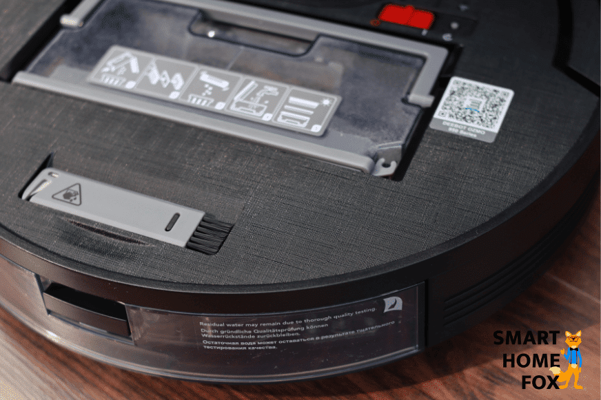 Ecovacs Deebot OZMO 950 stands with an open lid